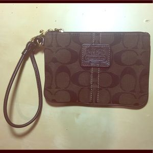 Chocolate colored Coach wristlet